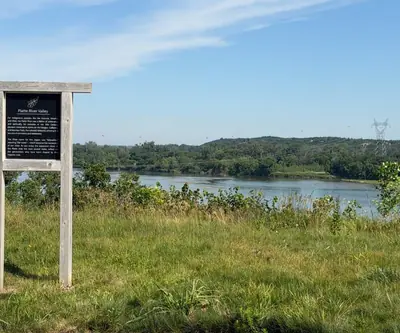 Platte River Valley sign overlooking the river and wooded bluffs at Quarry Oaks Golf Club in Ashland, Nebraska
