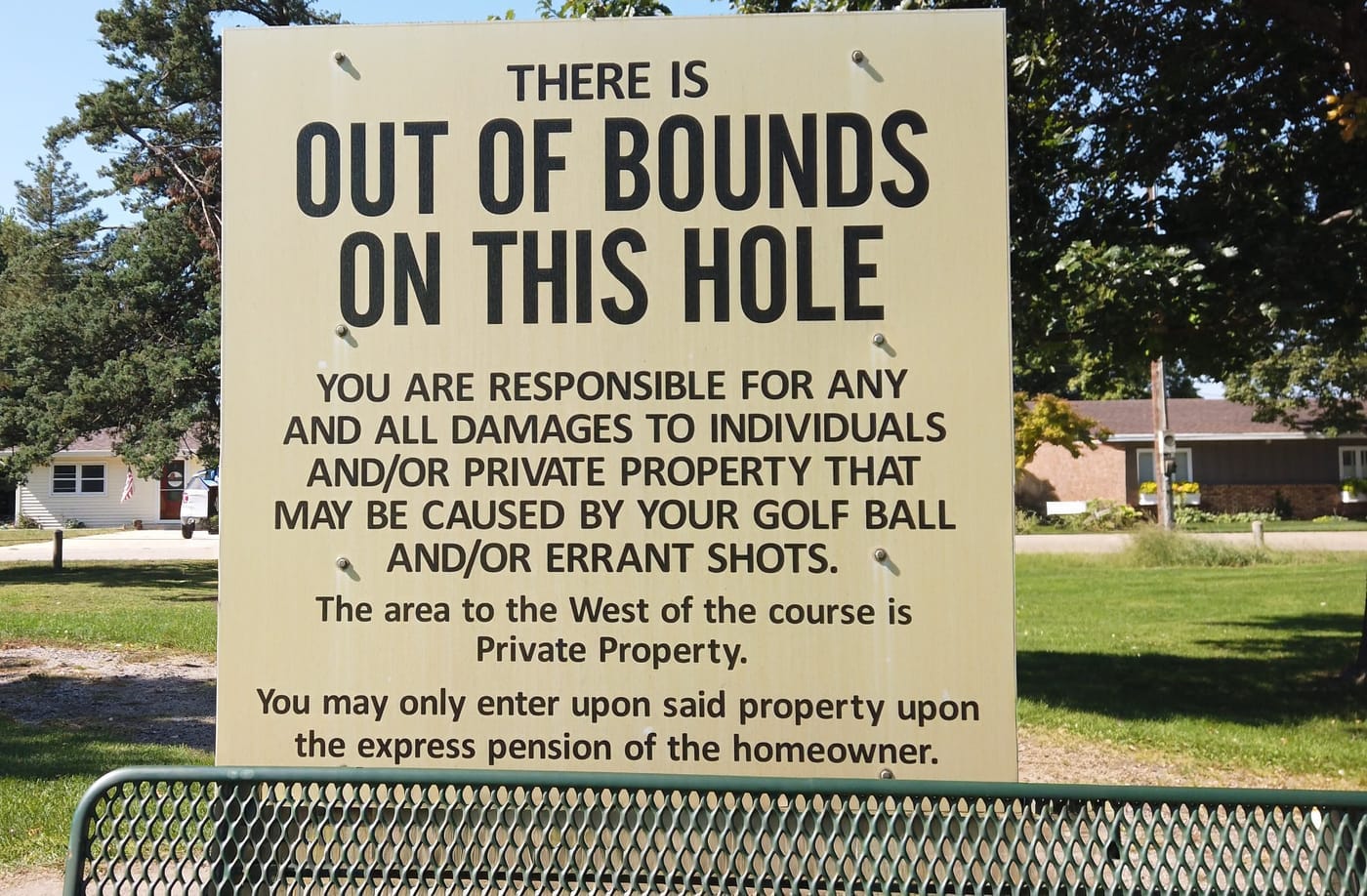 Funny sign on hole #2 at Van Berg Golf Course in Columbus, NE warns golfers about hitting balls into homeowners yards