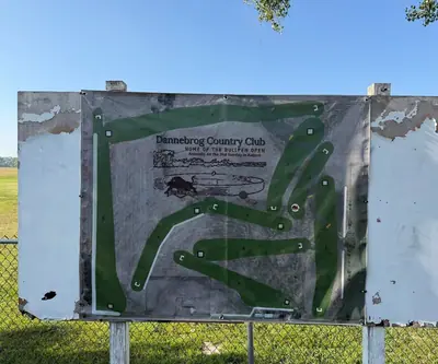 Weathered hole layout map sign, Home of the Bullpen Open, at Dannebrog Country Club in Dannebrog, Nebraska