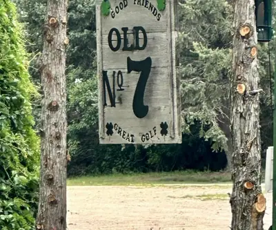 Rustic log-post sign reading Old No 7 at Gordon Country Club and Golf Course in Gordon, Nebraska