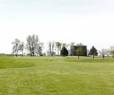 Out here the course runs right up against the grain bins and farmsteads of Leigh, Nebraska.