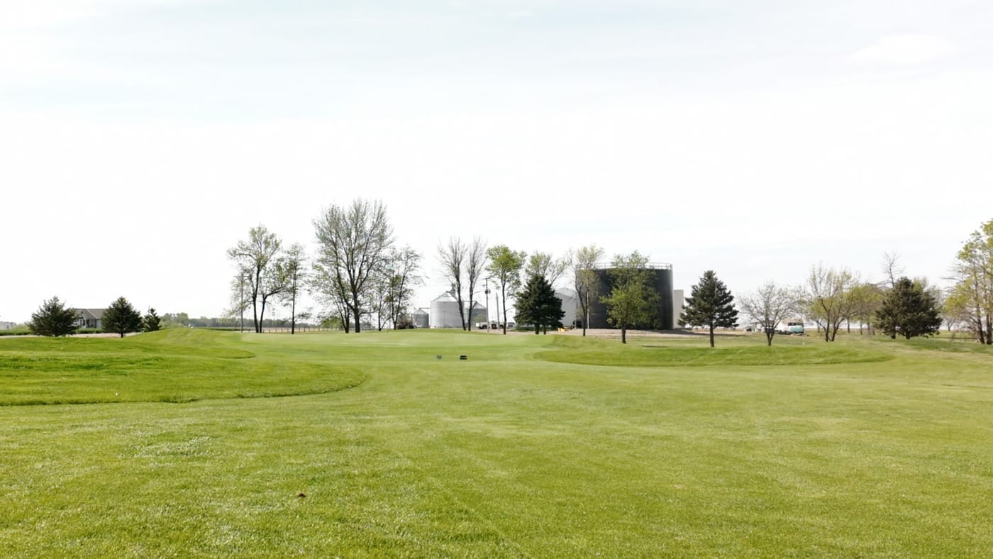 Out here the course runs right up against the grain bins and farmsteads of Leigh, Nebraska.