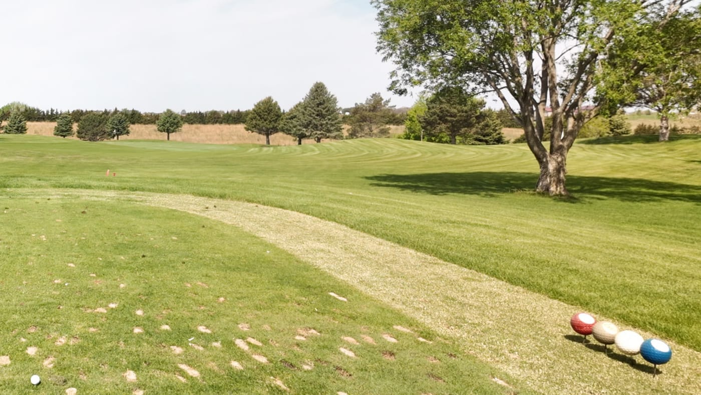 Red, white, and blue tee markers at Club 91 Golf Course, a par 36 nine in Leigh, Nebraska.