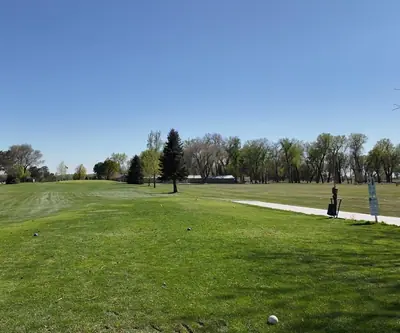 Tee box with a ball and markers looking down an open fairway at St. Paul Country Club in St. Paul, Nebraska